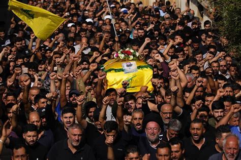 Hezbollah and Israel exchange fire and warnings of a widened war
